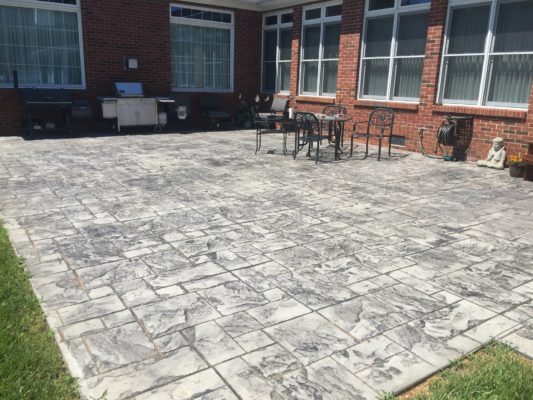 colored stamped concrete patio